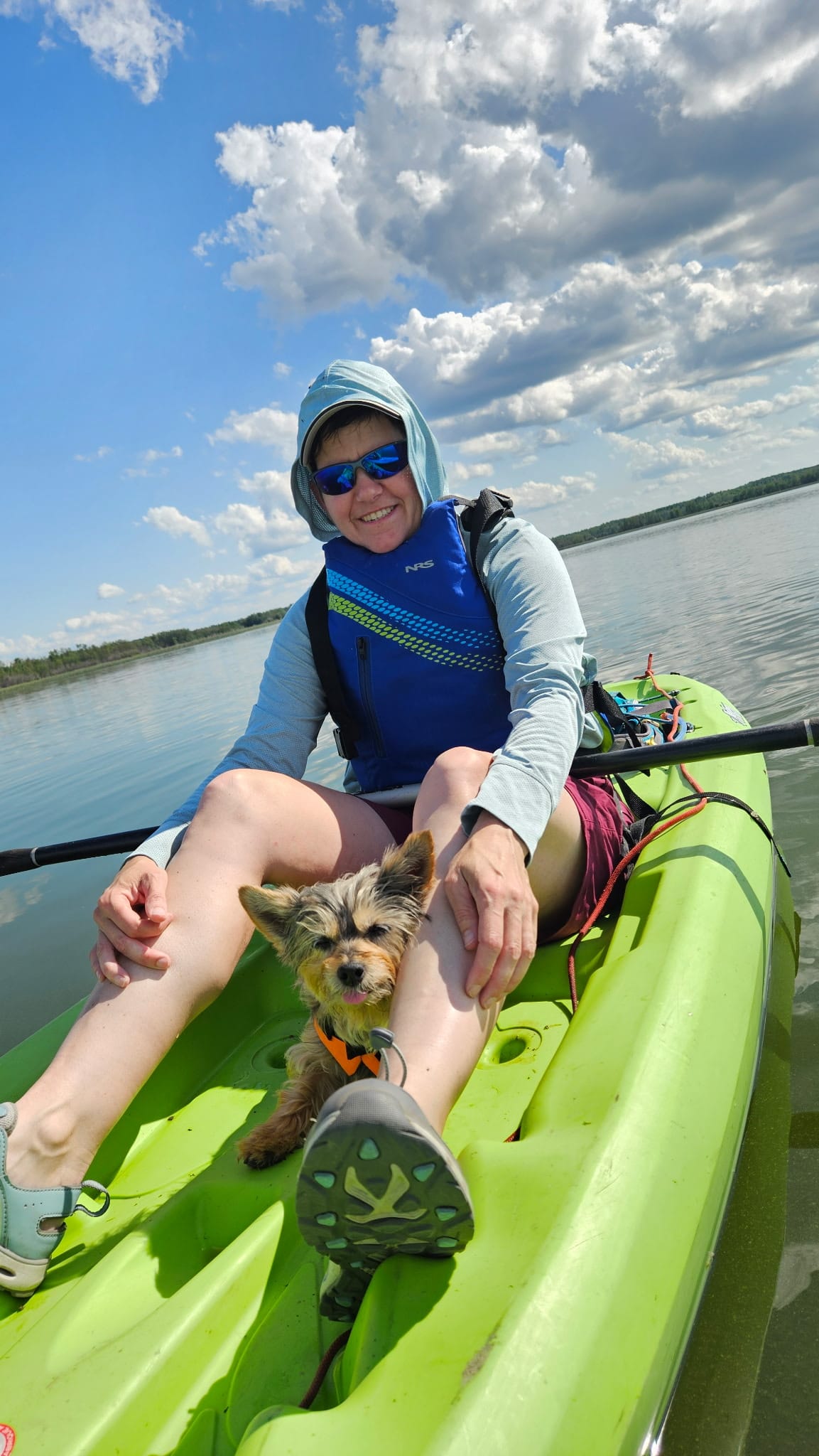 Out on the water by kayak, with the dog along for the ride